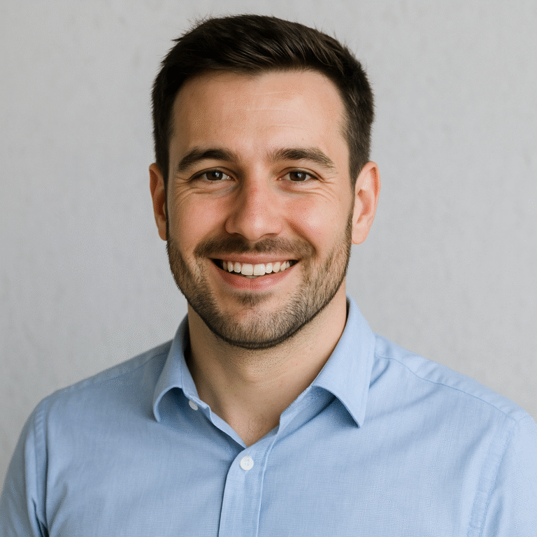 a man smiling at the camera